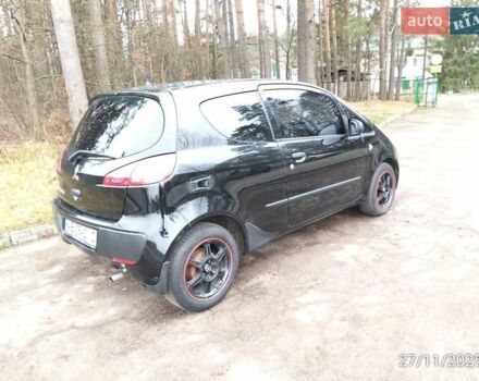 Черный Мицубиси Кольт, объемом двигателя 1.1 л и пробегом 251 тыс. км за 3200 $, фото 2 на Automoto.ua