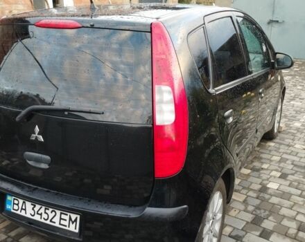 Черный Мицубиси Кольт, объемом двигателя 1.3 л и пробегом 215 тыс. км за 4300 $, фото 1 на Automoto.ua