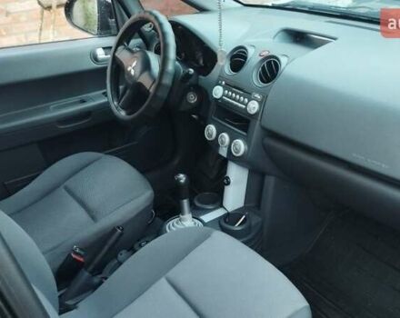 Чорний Міцубісі Кольт, об'ємом двигуна 1.3 л та пробігом 215 тис. км за 3800 $, фото 4 на Automoto.ua