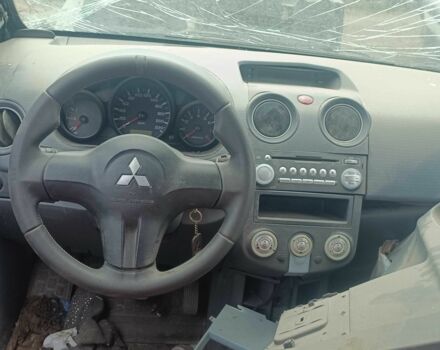 Чорний Міцубісі Кольт, об'ємом двигуна 1.3 л та пробігом 200 тис. км за 500 $, фото 5 на Automoto.ua