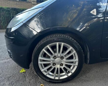 Черный Мицубиси Кольт, объемом двигателя 1.3 л и пробегом 211 тыс. км за 2990 $, фото 7 на Automoto.ua