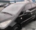 Чорний Міцубісі Кольт, об'ємом двигуна 1.3 л та пробігом 184 тис. км за 5000 $, фото 5 на Automoto.ua