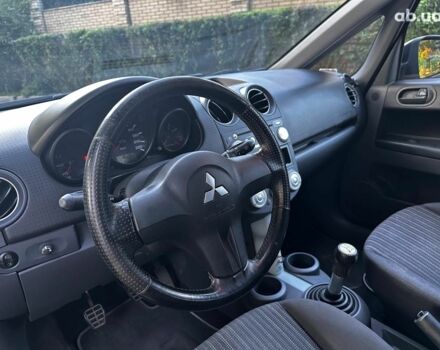 Черный Мицубиси Кольт, объемом двигателя 1.3 л и пробегом 211 тыс. км за 2990 $, фото 13 на Automoto.ua