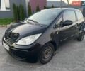 Черный Мицубиси Кольт, объемом двигателя 1.33 л и пробегом 220 тыс. км за 950 $, фото 1 на Automoto.ua