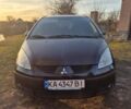 Чорний Міцубісі Кольт, об'ємом двигуна 1.33 л та пробігом 184 тис. км за 5000 $, фото 1 на Automoto.ua