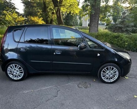 Черный Мицубиси Кольт, объемом двигателя 1.3 л и пробегом 211 тыс. км за 2990 $, фото 3 на Automoto.ua