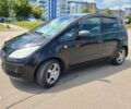 Черный Мицубиси Кольт, объемом двигателя 1.3 л и пробегом 225 тыс. км за 4886 $, фото 1 на Automoto.ua