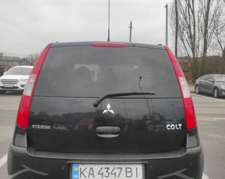 Черный Мицубиси Кольт, объемом двигателя 1.33 л и пробегом 184 тыс. км за 5000 $, фото 1 на Automoto.ua