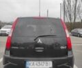 Черный Мицубиси Кольт, объемом двигателя 1.33 л и пробегом 184 тыс. км за 5000 $, фото 1 на Automoto.ua