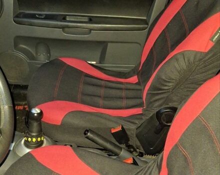 Черный Мицубиси Кольт, объемом двигателя 1.3 л и пробегом 280 тыс. км за 3500 $, фото 4 на Automoto.ua