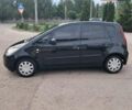 Черный Мицубиси Кольт, объемом двигателя 1.33 л и пробегом 87 тыс. км за 5099 $, фото 2 на Automoto.ua