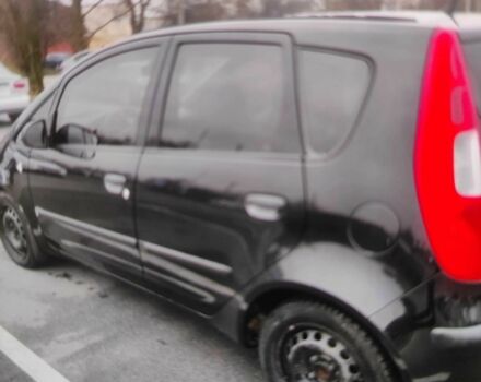 Чорний Міцубісі Кольт, об'ємом двигуна 1.3 л та пробігом 184 тис. км за 5000 $, фото 2 на Automoto.ua