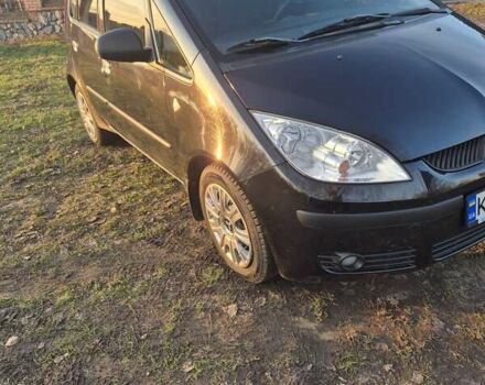 Чорний Міцубісі Кольт, об'ємом двигуна 1.33 л та пробігом 184 тис. км за 5000 $, фото 1 на Automoto.ua