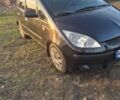 Чорний Міцубісі Кольт, об'ємом двигуна 1.33 л та пробігом 184 тис. км за 5000 $, фото 1 на Automoto.ua