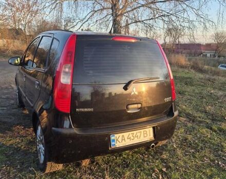 Чорний Міцубісі Кольт, об'ємом двигуна 1.33 л та пробігом 184 тис. км за 5000 $, фото 3 на Automoto.ua