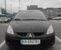 Черный Мицубиси Кольт, объемом двигателя 1.33 л и пробегом 184 тыс. км за 5000 $, фото 1 на Automoto.ua