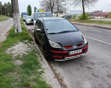 Черный Мицубиси Кольт, объемом двигателя 1.3 л и пробегом 280 тыс. км за 3500 $, фото 6 на Automoto.ua