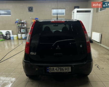Черный Мицубиси Кольт, объемом двигателя 1.33 л и пробегом 223 тыс. км за 3750 $, фото 3 на Automoto.ua