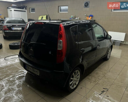 Черный Мицубиси Кольт, объемом двигателя 1.33 л и пробегом 223 тыс. км за 3750 $, фото 1 на Automoto.ua