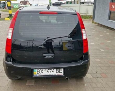 Черный Мицубиси Кольт, объемом двигателя 1.33 л и пробегом 234 тыс. км за 4555 $, фото 2 на Automoto.ua