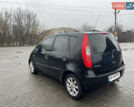 Чорний Міцубісі Кольт, об'ємом двигуна 1.3 л та пробігом 184 тис. км за 5000 $, фото 8 на Automoto.ua