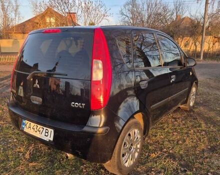 Чорний Міцубісі Кольт, об'ємом двигуна 1.33 л та пробігом 184 тис. км за 5000 $, фото 4 на Automoto.ua