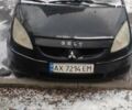 Черный Мицубиси Кольт, объемом двигателя 1.3 л и пробегом 202 тыс. км за 3900 $, фото 2 на Automoto.ua