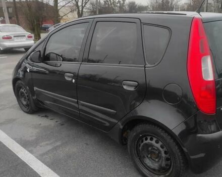 Черный Мицубиси Кольт, объемом двигателя 1.33 л и пробегом 184 тыс. км за 5000 $, фото 2 на Automoto.ua