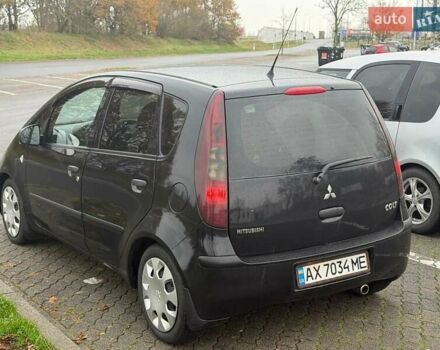 Чорний Міцубісі Кольт, об'ємом двигуна 1.33 л та пробігом 198 тис. км за 3900 $, фото 8 на Automoto.ua