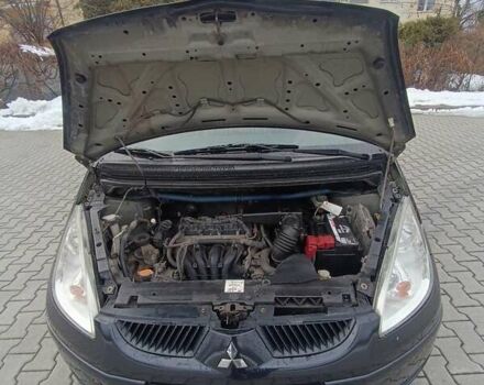 Чорний Міцубісі Кольт, об'ємом двигуна 1.33 л та пробігом 198 тис. км за 3900 $, фото 12 на Automoto.ua