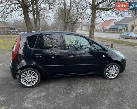 Черный Мицубиси Кольт, объемом двигателя 1.33 л и пробегом 133 тыс. км за 4000 $, фото 2 на Automoto.ua