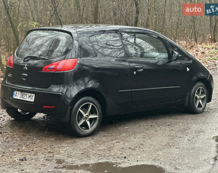 Чорний Міцубісі Кольт, об'ємом двигуна 1.32 л та пробігом 181 тис. км за 4400 $, фото 2 на Automoto.ua