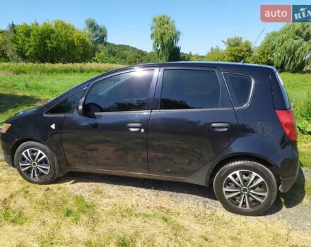 Черный Мицубиси Кольт, объемом двигателя 1.3 л и пробегом 106 тыс. км за 5500 $, фото 1 на Automoto.ua