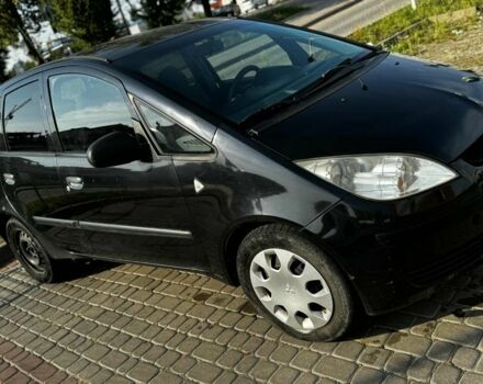 Чорний Міцубісі Кольт, об'ємом двигуна 1.3 л та пробігом 150 тис. км за 4400 $, фото 5 на Automoto.ua