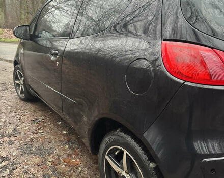 Чорний Міцубісі Кольт, об'ємом двигуна 1.32 л та пробігом 181 тис. км за 4400 $, фото 5 на Automoto.ua