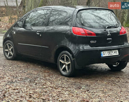 Чорний Міцубісі Кольт, об'ємом двигуна 1.32 л та пробігом 181 тис. км за 4400 $, фото 4 на Automoto.ua
