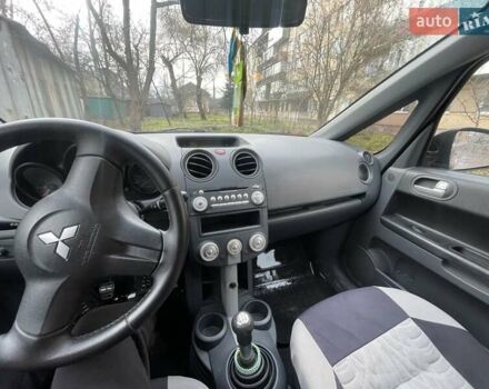 Чорний Міцубісі Кольт, об'ємом двигуна 1.33 л та пробігом 217 тис. км за 4000 $, фото 5 на Automoto.ua
