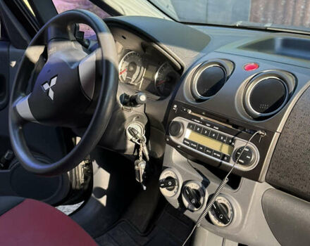 Черный Мицубиси Кольт, объемом двигателя 1.33 л и пробегом 130 тыс. км за 5700 $, фото 4 на Automoto.ua