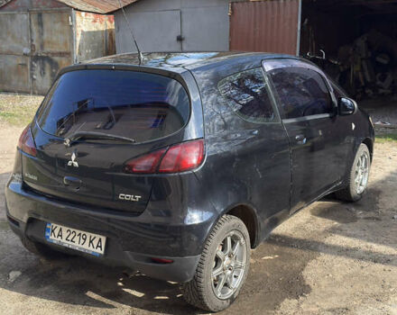 Черный Мицубиси Кольт, объемом двигателя 1.33 л и пробегом 130 тыс. км за 5700 $, фото 7 на Automoto.ua