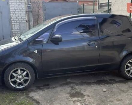 Чорний Міцубісі Кольт, об'ємом двигуна 1.3 л та пробігом 110 тис. км за 5900 $, фото 4 на Automoto.ua