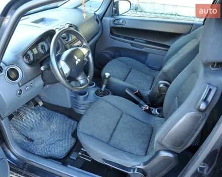 Черный Мицубиси Кольт, объемом двигателя 1.12 л и пробегом 251 тыс. км за 3800 $, фото 13 на Automoto.ua