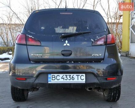 Черный Мицубиси Кольт, объемом двигателя 1.12 л и пробегом 251 тыс. км за 3800 $, фото 9 на Automoto.ua