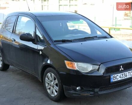 Черный Мицубиси Кольт, объемом двигателя 1.12 л и пробегом 251 тыс. км за 3800 $, фото 4 на Automoto.ua