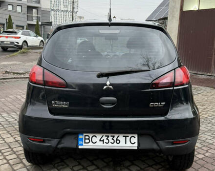 Черный Мицубиси Кольт, объемом двигателя 1.1 л и пробегом 250 тыс. км за 3700 $, фото 4 на Automoto.ua