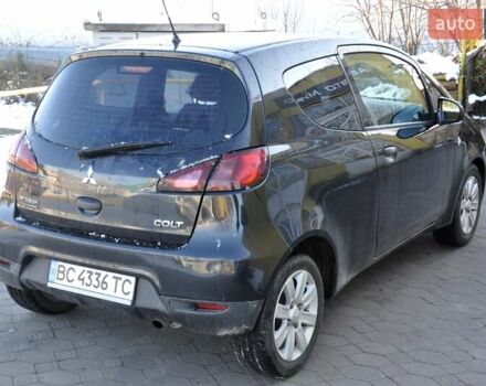Черный Мицубиси Кольт, объемом двигателя 1.12 л и пробегом 251 тыс. км за 3800 $, фото 6 на Automoto.ua