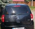 Черный Мицубиси Кольт, объемом двигателя 1.33 л и пробегом 135 тыс. км за 6500 $, фото 1 на Automoto.ua