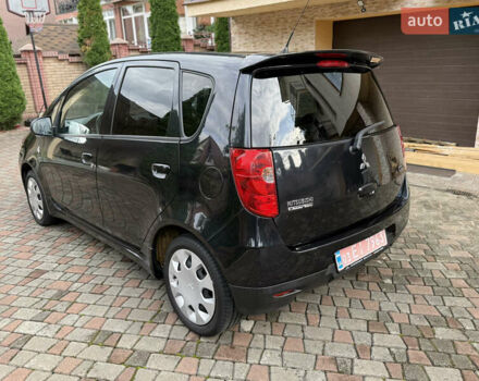 Черный Мицубиси Кольт, объемом двигателя 1.3 л и пробегом 173 тыс. км за 5800 $, фото 7 на Automoto.ua