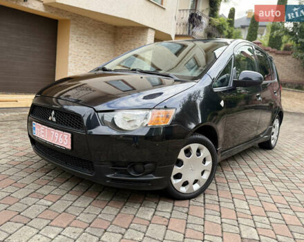 Черный Мицубиси Кольт, объемом двигателя 1.3 л и пробегом 173 тыс. км за 5800 $, фото 1 на Automoto.ua