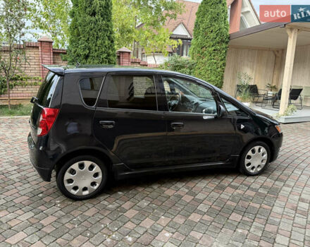 Черный Мицубиси Кольт, объемом двигателя 1.3 л и пробегом 173 тыс. км за 5800 $, фото 5 на Automoto.ua