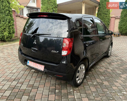 Черный Мицубиси Кольт, объемом двигателя 1.3 л и пробегом 173 тыс. км за 5800 $, фото 6 на Automoto.ua